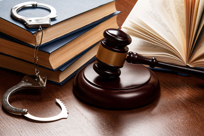 handcuffs and gavel